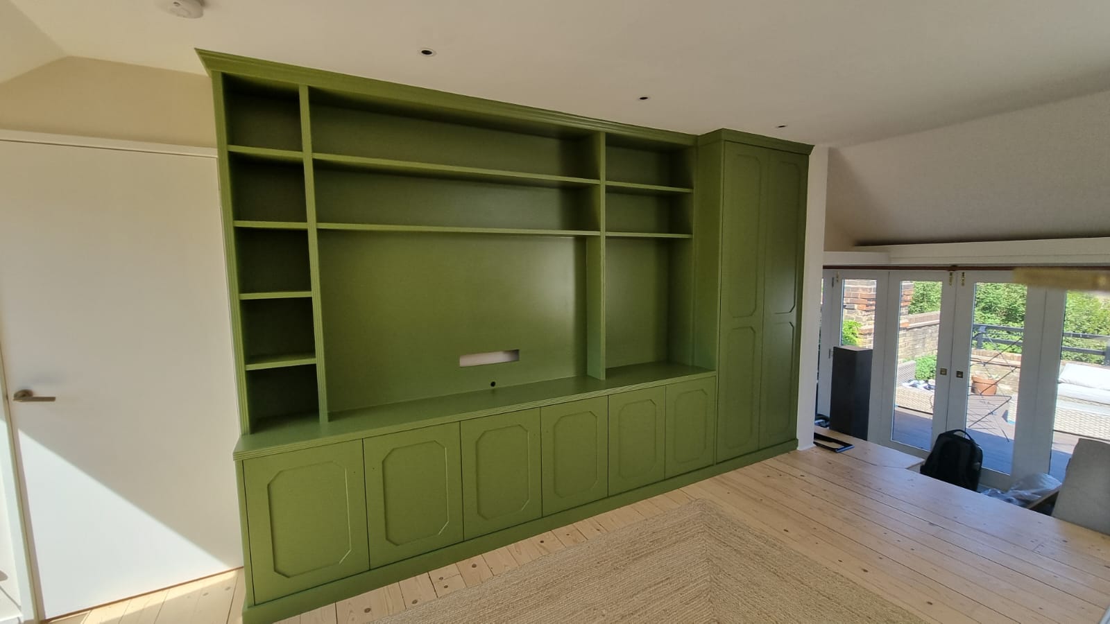 Bespoke fitted wardrobe in a modern bedroom